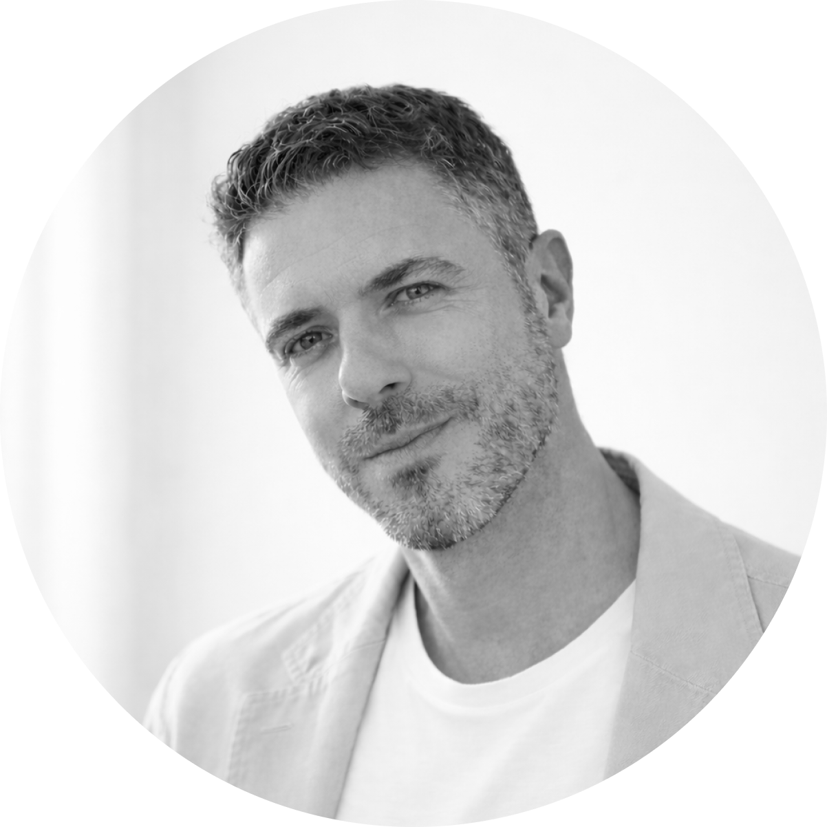 Black and white circular portrait of Jonathan Campbell.